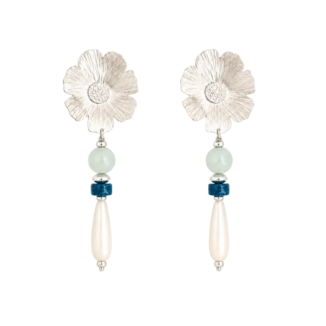 A pair of silver daisy drop earrings featuring textured silver flower petals, a light green bead, a dark blue spacer bead, and a teardrop-shaped cream pearl dangle, set against a plain white background.