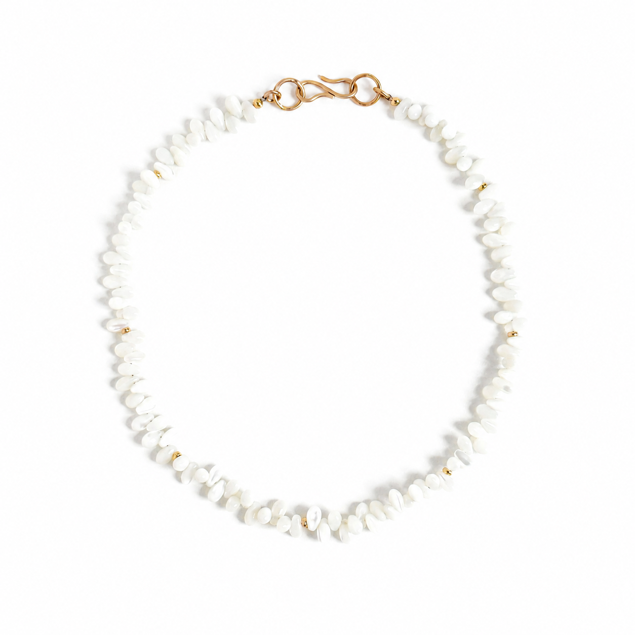 A delicate necklace made of small white irregular mother of pearl shell beads with small gold spacer beads and a gold lobster clasp, displayed on a clean white background.