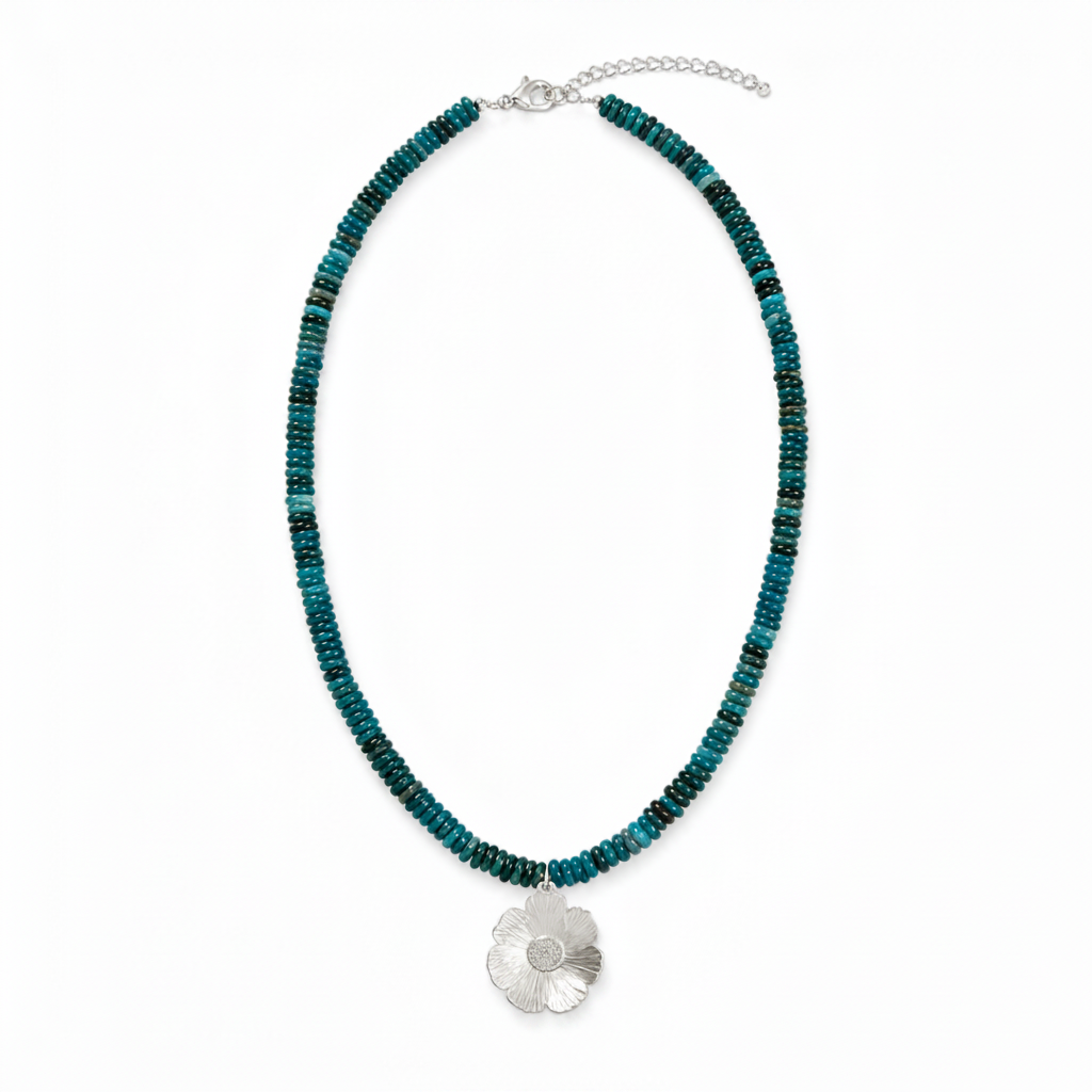 Blue apatite gemstone necklace with a handcrafted floral pendant in sterling silver.