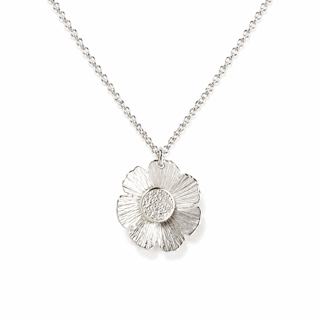 A silver flower pendant necklace on a delicate silver chain, displayed against a clean white background. Handmade in Georgetown, Texas by OH LITTLE FOXES.