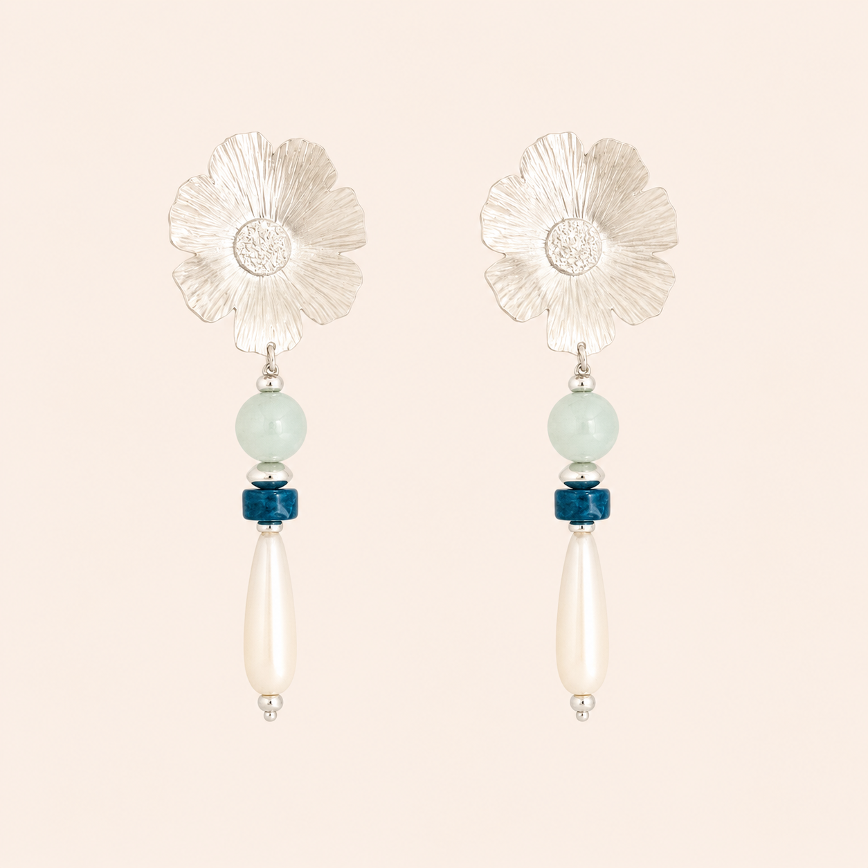 Handcrafted sterling silver floral drop earrings featuring textured flower studs with blue apatite, amazonite, and elongated mother-of-pearl drops.
