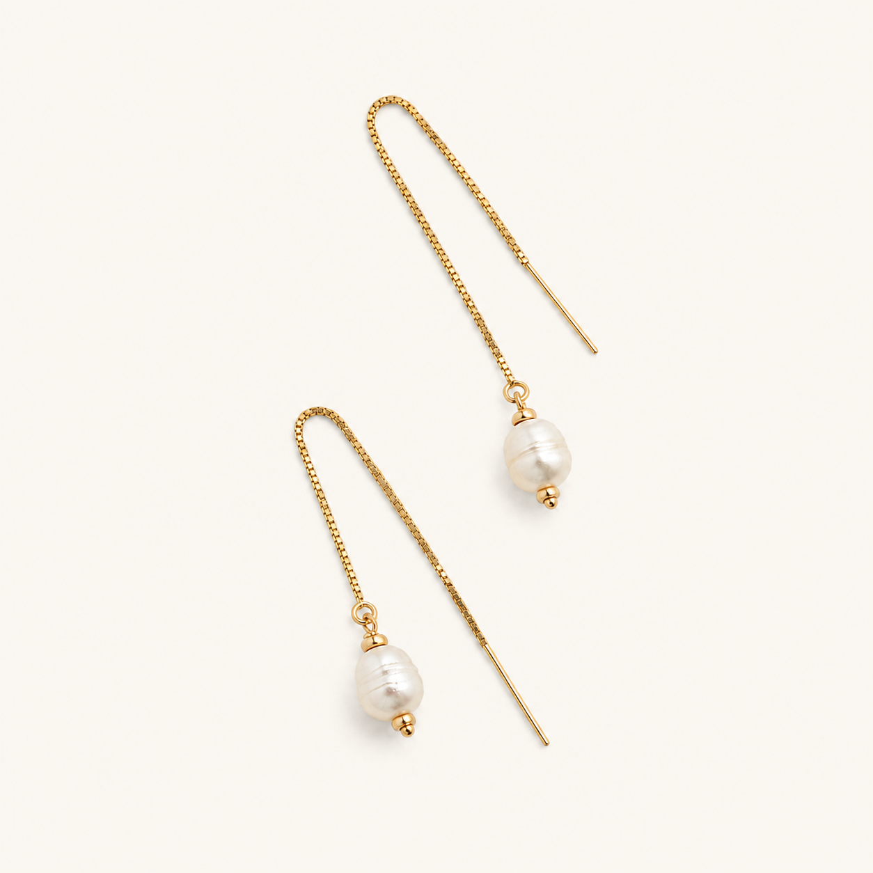A pair of gold drop threader earrings with baroque white pearls, handmade. 